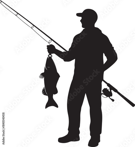 Fisherman silhouette in cap standing with fishing rod and freshly caught big fish outdoor