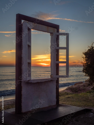 Window overlooking the sea in Tavernes de la Valldigna (Valencia, Spain)