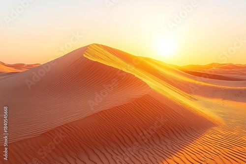 Fototapeta Naklejka Na Ścianę i Meble -  Desert landscape with wavy sand dunes under a sunlit sky during golden hour