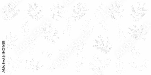 A pattern of grey paw prints scattered across a plain white background