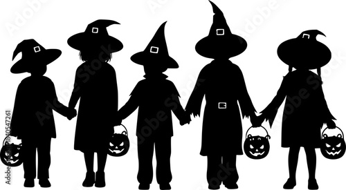 Silhouettes of children in halloween costumes holding hands and candy buckets 