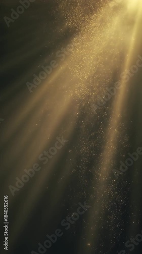 Ultra Slow Motion: Luminous Water Particles Rising, Catching Soft Golden Light Rays