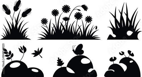 Black grass, wildflower, and stone silhouettes vector set
