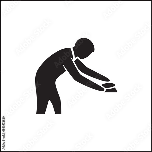 Man bending over and picking up object, simple black silhouette icon for web and app ui