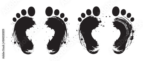 Abstract black brushstroke footprints with a grunge texture creating a unique artistic design, symbolizing movement, journey, and human presence.