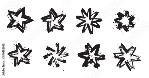 Brushstroke star shapes collection featuring a variety of hand-drawn grunge ink elements with textured splatters, perfect for abstract graphic design.