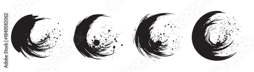 Four black ink brushstrokes with splatters create a dynamic and artistic abstract design, perfect for various creative projects and graphic elements.