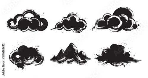 Hand drawn brush stroke elements showcase a collection of artistic ink shapes and mountain silhouettes, ideal for graphic design projects.