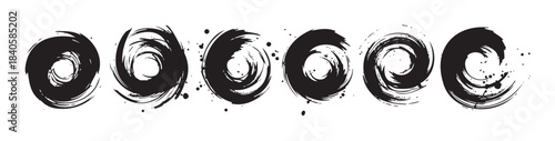 Abstract black ink brushstroke circles with dynamic swirling patterns and expressive splatters form a versatile set of graphic design elements.