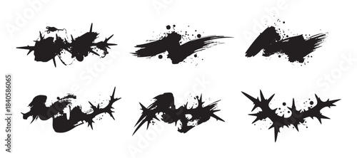 Abstract grunge ink splatters collection with sharp, spiky edges and textured brush strokes, creating a dynamic and edgy design element for various creative projects.