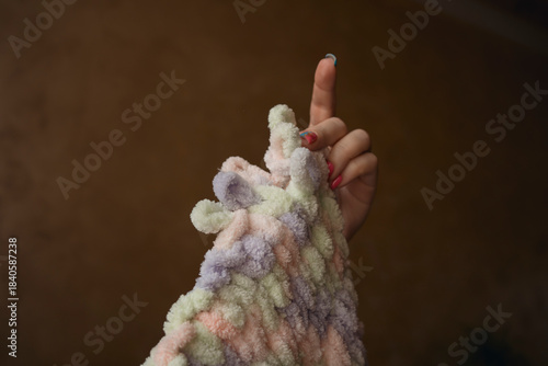 Knitting by fingers concept