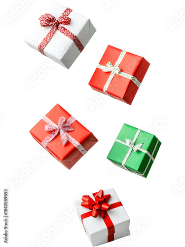 .Colorful Christmas gift boxes in green, red, and white tones floating on transparent background. Playful festive arrangement perfect for holiday graphics