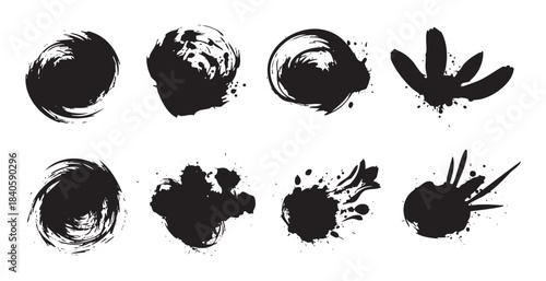 Black ink brush strokes collection of various artistic hand-drawn elements with textured splatters and abstract shapes for creative design.