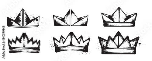Six stylized grunge hand drawn crowns feature a variety of unique designs with ink splatters, perfect for adding a regal and edgy touch to any creative project or design.