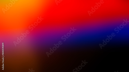 Abstract blurred background, gradient blue, red, purple, black.