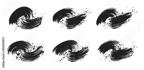 Abstract black brush strokes with dynamic ink splatters creating a set of expressive artistic design elements for creative projects.