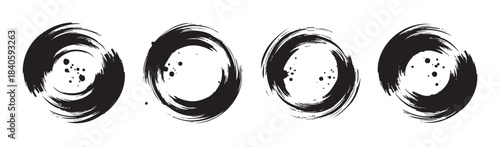 Four enso circles, meticulously crafted with textured brush strokes and expressive ink splatters, form a captivating set of artistic abstract design elements.