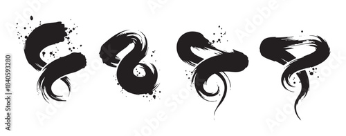 Black brush strokes with dynamic and expressive textures create an artistic and versatile graphic element for various design projects.