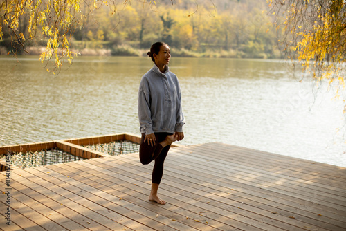 Korean woman practicing yog...