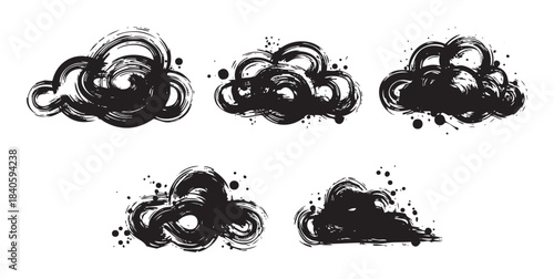 Abstract ink brush stroke cloud shapes form a versatile set of artistic grunge design elements, perfect for creative projects and graphic compositions.