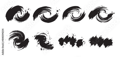 Black ink brush strokes and splatters form a dynamic collection of artistic elements, perfect for creative design projects and graphic overlays.