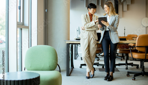 Business meeting moments in a modern office with professional women discussing ideas