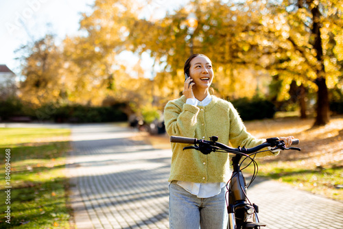 Korean woman rides bicycle ...