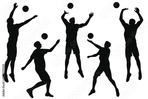 Silhouettes of volleyball players in action during a game or practice session