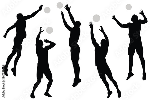  Silhouettes of volleyball players in action during a competitive match