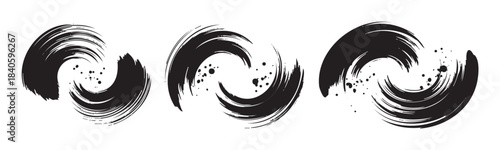Abstract brush strokes form a captivating trio of swirling black ink designs with expressive textures and artistic splatters, evoking a sense of dynamic movement.