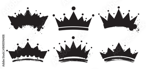 Six black grunge crown silhouettes are depicted with artistic ink splatters and brush strokes, symbolizing royalty, power, and success.
