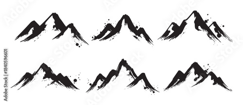 Abstract ink brushstroke mountains collection featuring various stylized peaks with textured details, perfect for minimalist design projects.