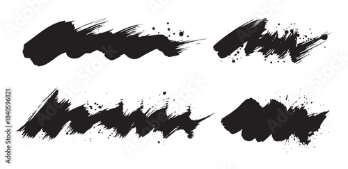 Black brush strokes with ink splatters create a versatile and expressive artistic design element for various creative projects and graphic designs.