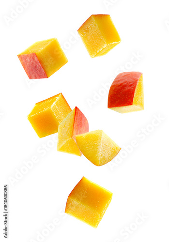 Cubic and triangular mango pieces form an unusual figure look like a loop. Isolated on white