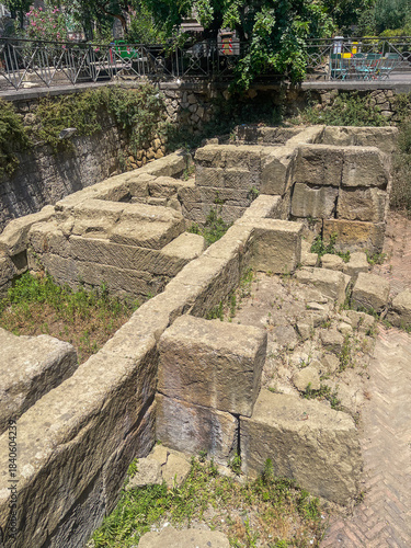 Naples, Italy - July 17, 2024: Ancient Greek Walls discovered under Piazza Bellini