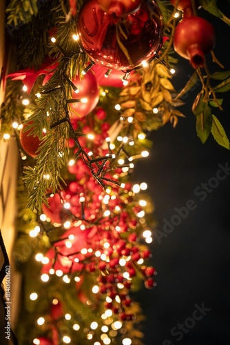 Golden Christmas tree decoration with holiday ornaments and bright lights