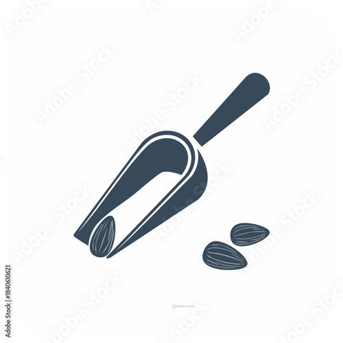 Scoop utensil with almonds symbolizing healthy eating and food preparation