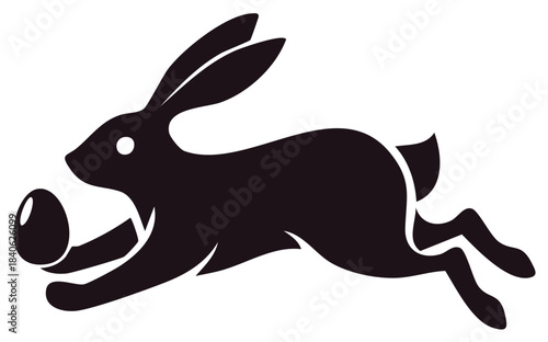 Black silhouette of a rabbit leaping with an egg in its paw