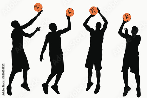 Silhouettes of basketball players in various action poses during a game