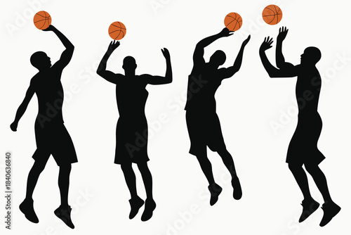 Silhouettes of basketball players jumping and shooting a basketball during a game