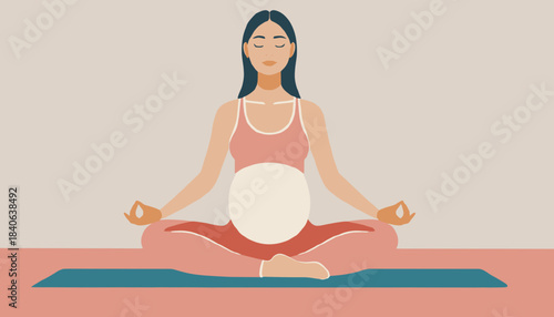 Pregnant woman meditating in the lotus position on a yoga mat