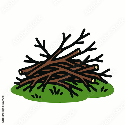 Pruned branches on grass pile 