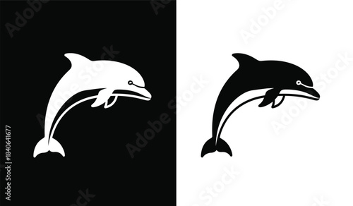 a striking visual representation features two dynamic dolphin silhouettes one in stark white against a black backdrop and the other in black on white