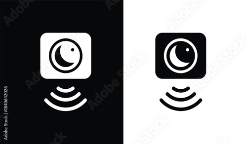 A striking visual representation depicts a pair of stylized camera icons one on a black background and one on white utilizing a minimalist aesthetic