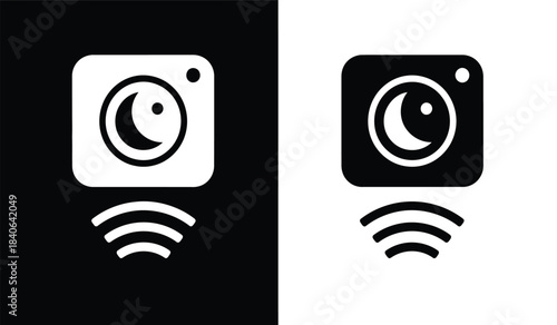 this image presents a stark visual contrast featuring two identical camera icons one white on a black background and the other black on white