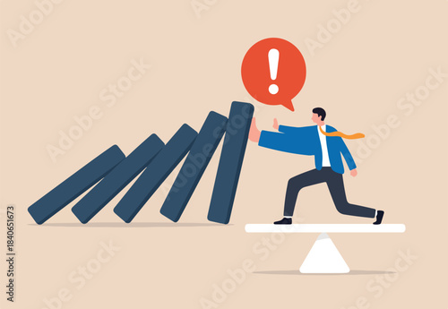 Control risk in investment crisis, failure prevention, stop domino effect, protection or solution to solve problem, stop uncertainty or insurance concept, businessman stop domino collapsing despair.