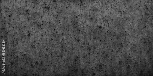 Dark grunge paper texture with a seamless blank gray wall surface background material