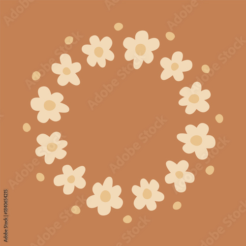 Cute round frame with daisy flowers in soft beige colors isolated on brown background.