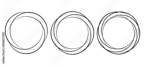 Three circular objects with double lined borders in a row on a