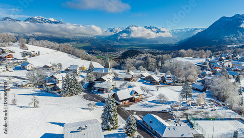 The village of Gurtis with snow by Nenzing, Walgau Valley, State of Vorarlberg, Austria, Drone Photography